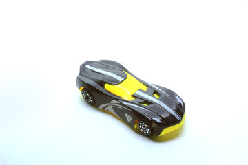 a photo of a miniature car as a medium for children's recognition of transportation at school