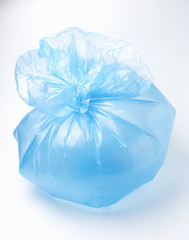 Disposable plastic bags for household garbage or waste on a white background