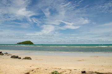 Beaches by the sea and the sky with white clouds
