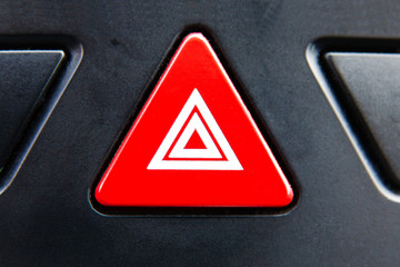 Triangle Car emergency lights button. Close up. macro view
