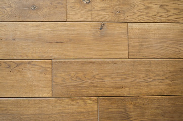 Ceramic tile with a wood texture on a kitchen or living room.