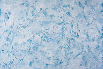 Textural blue with white background made of blue and white paint. Water-based putty swabs