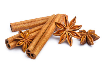 Delicious cinnamon sticks and star anise, isolated on white background