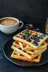 Belgian or american waffles (delicious sweet dish, dessert snack) menu concept. background. top view. copy space for text