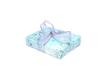 wrapped holiday gift box silver ribbon bow, isolated on white background, side view