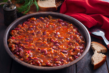 Chili con carne, traditional Mexican dish with beef and beans, selective focus