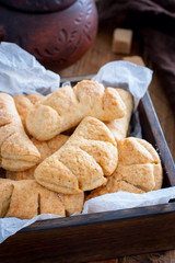 homemade cookies with sugar on top in a wooden box, selective focus