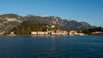 Fototapeta na wymiar panoramic view of Lake Como, the Alps and the city of Bellagio from the ferry, Lake Como, Italy