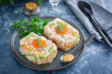Homemade jelly with chicken, pork peas with slices of carrots, horizontal