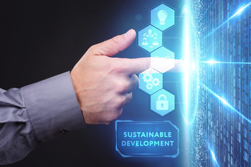 Obraz premium Business, Technology, Internet and network concept. Young businessman working on a virtual screen of the future and sees the inscription:
