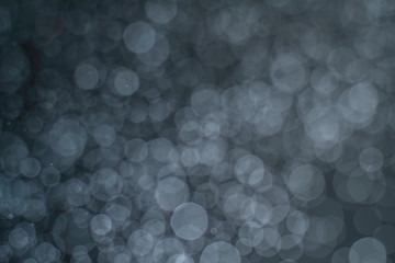 abstract subtle bokeh bright on dark bacground for holiday , blurred image