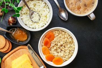 breakfast (oatmeal porridge, dairy products and more, snack) menu concept background. top view. copy space for text