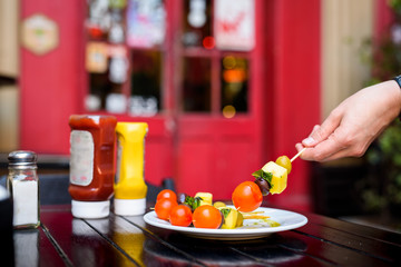 woman eating vegetables