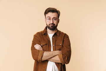 Portrait of a cheerful young arttractive bearded man