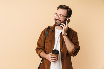 Portrait of a cheerful young arttractive bearded man