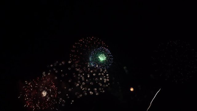 Colorful fireworks on black background.