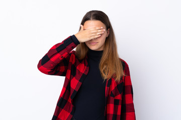 Teenager girl over isolated white background covering eyes by hands. Do not want to see something