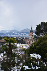 The beautiful Alpine town of Meran / Merano in south Tyrol, covered in snow in the winter. 