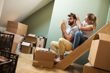 Excitedly settling into their first apartment, the couple discovers memory books while unpacking,...