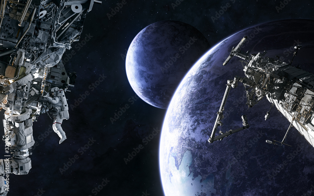 Wall mural space station, astronaut on background of planets in deep space. science fiction. elements of this i