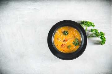 Delicious vegetable potato soup served in a bowl