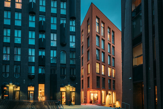 Fototapeta Tallinn, Estonia. View Of Historical Rotermann City In Evening Illuminations. Rotermann Quarter Includes Old Industrial Buildings With New Function And Modern Architecture