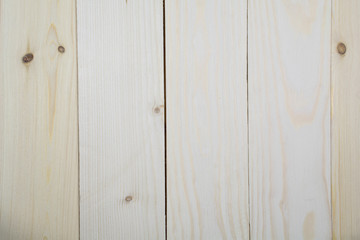 The structure of the vertical panel of light wood.