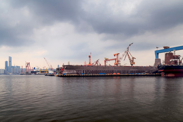 A shipyard in a seaside port