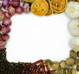 frame made of dried herbs and vegetables isolated on white