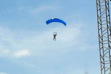 paraglider in the sky, skydiver.