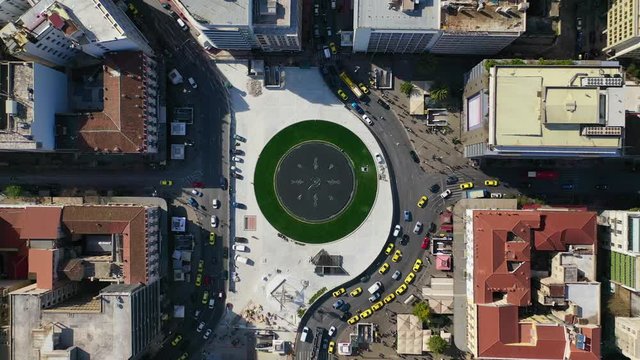 Aerial drone video of recently renovated fountain of famous round square of Omonia in the heart of Athens centre, Attica, Greece