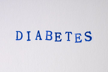 Fototapeta na wymiar a diabetes word stamped on a piece of paper.