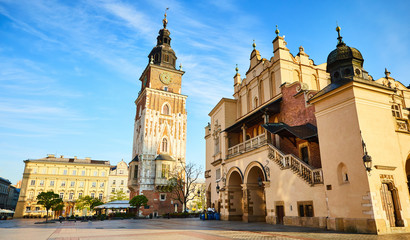 Fototapeta na wymiar Cityscape view on the Market square with Cloth Hall building during the morning light in Krakow, Poland