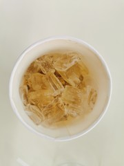 Coffee and Ice in cup.