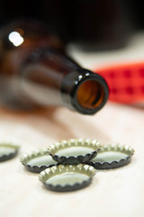 top of beer bottle and caps