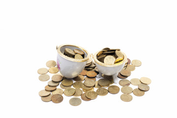 Coins on the ceramic egg