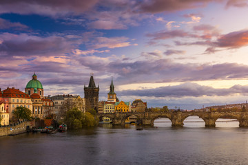 Scenic spring sunset aerial view of the Prague Old Town pier architecture and Charles Bridge over Vltava river in Prague, Czech Republic