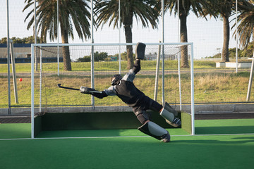 Front view of a Caucasian male field hockey goalkeeper