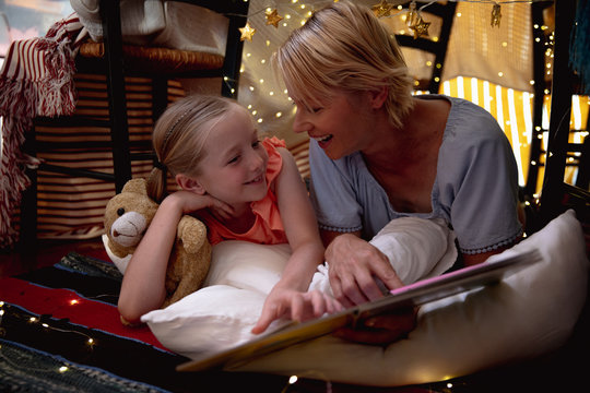 Mother and daughter discussing together  