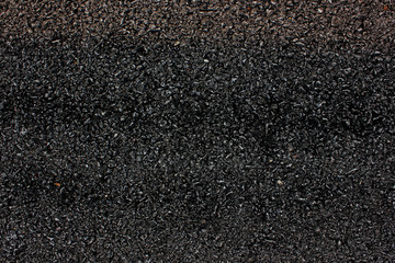 Black asphalt texture background. Asphalt road micro detailed texture. Old black background. Grunge texture. Dark wallpaper. Blackboard. Chalkboard