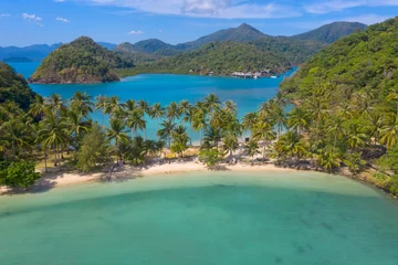 Foto op Canvas Aerial view. Top view.amazing nature background.The color of the water and beautifully bright.Azure beach with rocky mountains and clear water of Thailand ocean at sunny day. © MAGNIFIER