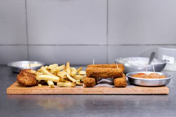 fried table served on wooden board