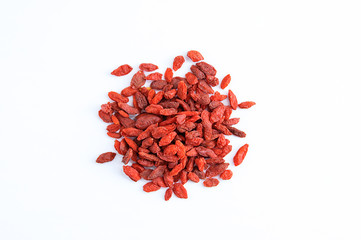 Dry goji berry fruits close-up on a white background.