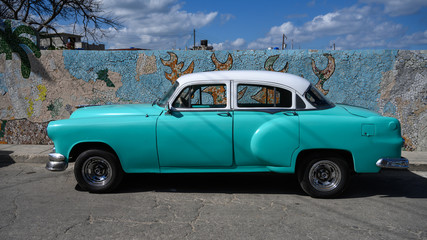 Fototapeta na wymiar Vintage car parked at roadside, Fusterlandia, Jaimanitas, Playa, Havana, Cuba