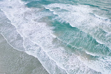 Aerial view and top view. Beautiful natural backdrop. Amazing nature background.The color of the water and beautifully bright.Azure beach with rocky mountains and clear water of Norway ocean . © MAGNIFIER