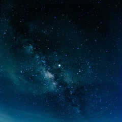 Milky way galaxy with stars and space in the universe background at thailand