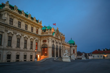 Fototapeta na wymiar Upper Belvedere Palace (Schloss Oberes Belvedere) in Vienna, Austria. Blue twilight sky. One of Vienna main attractions