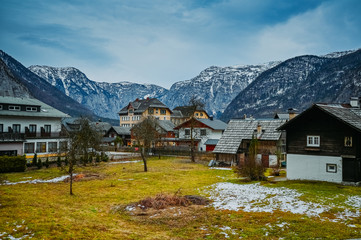 Famous Hallstatt mountain village and alpine lake top view landscape panorama, Austrian Alps, Austria. Landmark with traditional wooden houses on the lake. Unesco. Salzkammergut region. Travel concept