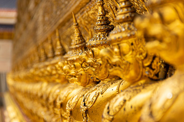 Many Garuda statues. It is an animal in the Himmapan myth of Thailand. It is decorated around the chapel of Wat Phra Kaew , Bangkok ,Thailand