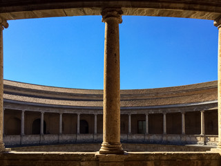 Fototapeta premium Granada, Andalusia / Spain - March 27 2015: Beautiful Infamous Alhambra Moorish Sprawling Hilltop Royal Fortress Complex